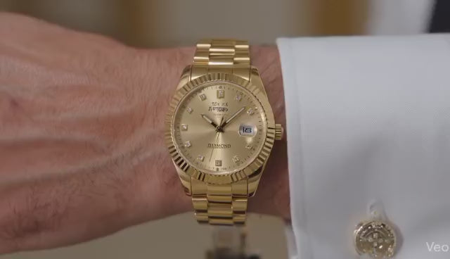 L'Élégance Signature : La Montre Finition Dorée au Design Intemporel